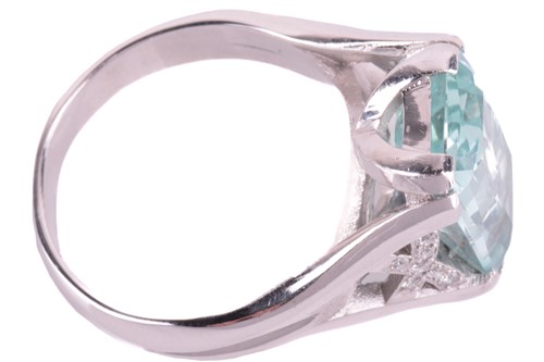 Lot 123 - A single stone aquamarine dress ring, the...