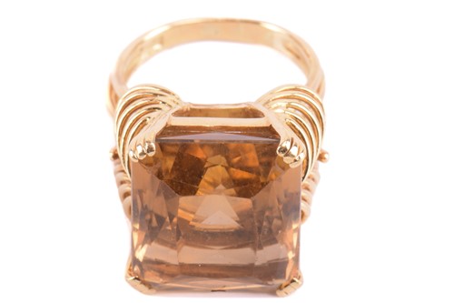 Lot 19 - A single stone citrine dress ring, the large...