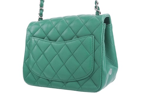 Lot 7 - Chanel - a mini flap bag in green...