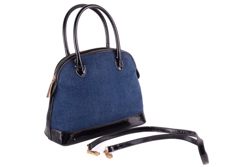 Lot 11 - An Escada bowler bag in denim with black...