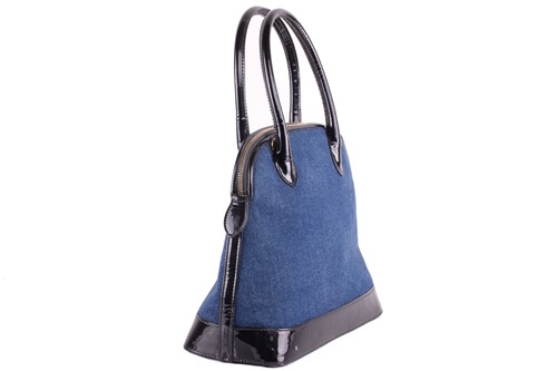 Lot 11 - An Escada bowler bag in denim with black...
