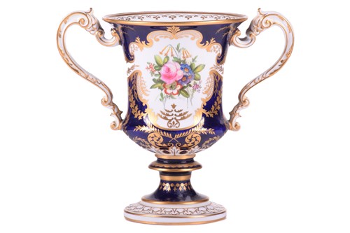 Lot 215 - A Royal Crown Derby bone China bleu de roi...