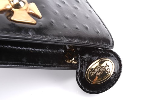 Lot 54 - Vivienne Westwood - an extra long clutch in...