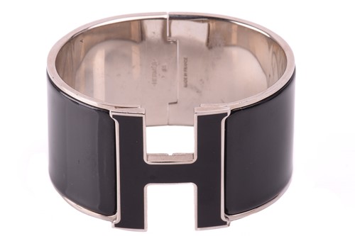Lot 44 - Hermès - an extra wide 'Clic Clac H' bracelet...