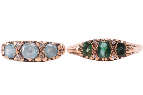 Lot 11 - An emerald three-stone ring, the largest...