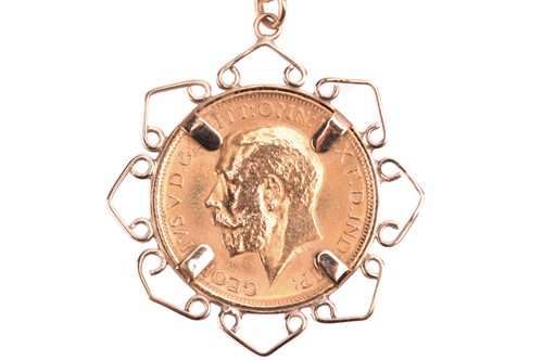 Lot 126 - A gold sovereign pendant necklace, the pendant...