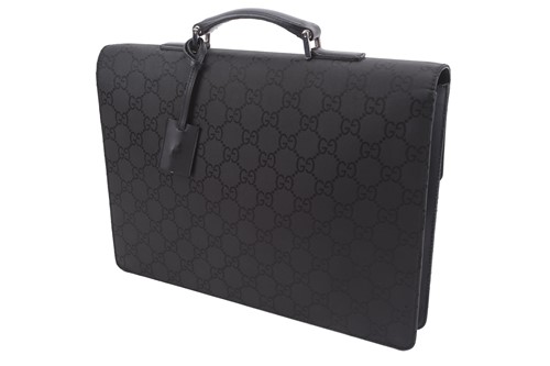 Lot 60 - Gucci - a large briefcase in black jacquard...
