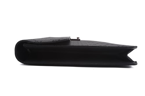 Lot 60 - Gucci - a large briefcase in black jacquard...