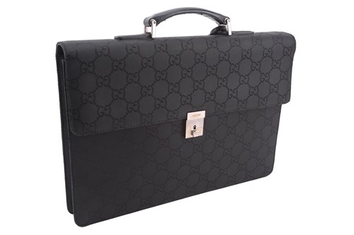 Lot 60 - Gucci - a large briefcase in black jacquard...