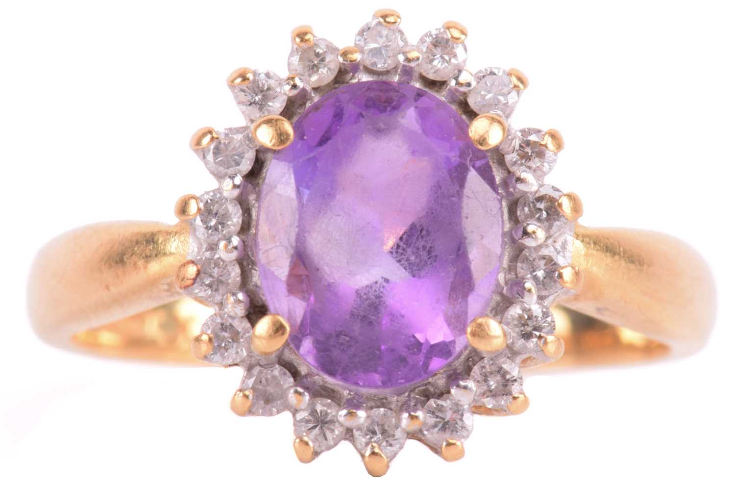 Lot 193 - An amethyst and diamond cluster ring, set with...