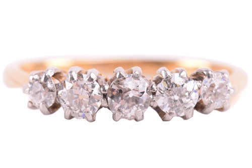 Lot 292 - A diamond five-stone ring, set with a row of...