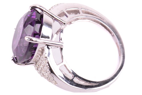 Lot 29 - A large amethyst and diamond cocktail ring,...