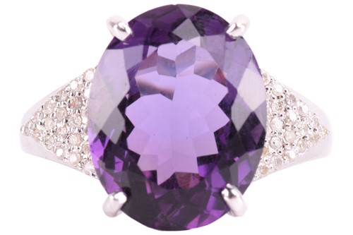 Lot 29 - A large amethyst and diamond cocktail ring,...