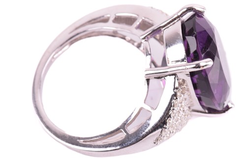 Lot 29 - A large amethyst and diamond cocktail ring,...