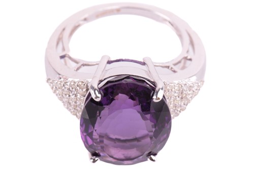 Lot 29 - A large amethyst and diamond cocktail ring,...