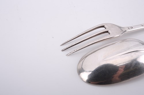 Lot 574 - A Queen Anne silver trefid silver spoon, oval...