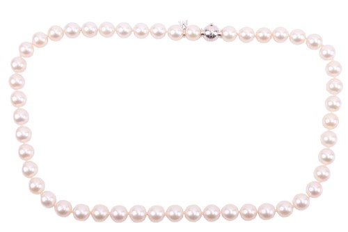 Lot 302 - Mikimoto. A slightly graduated cultured pearl...