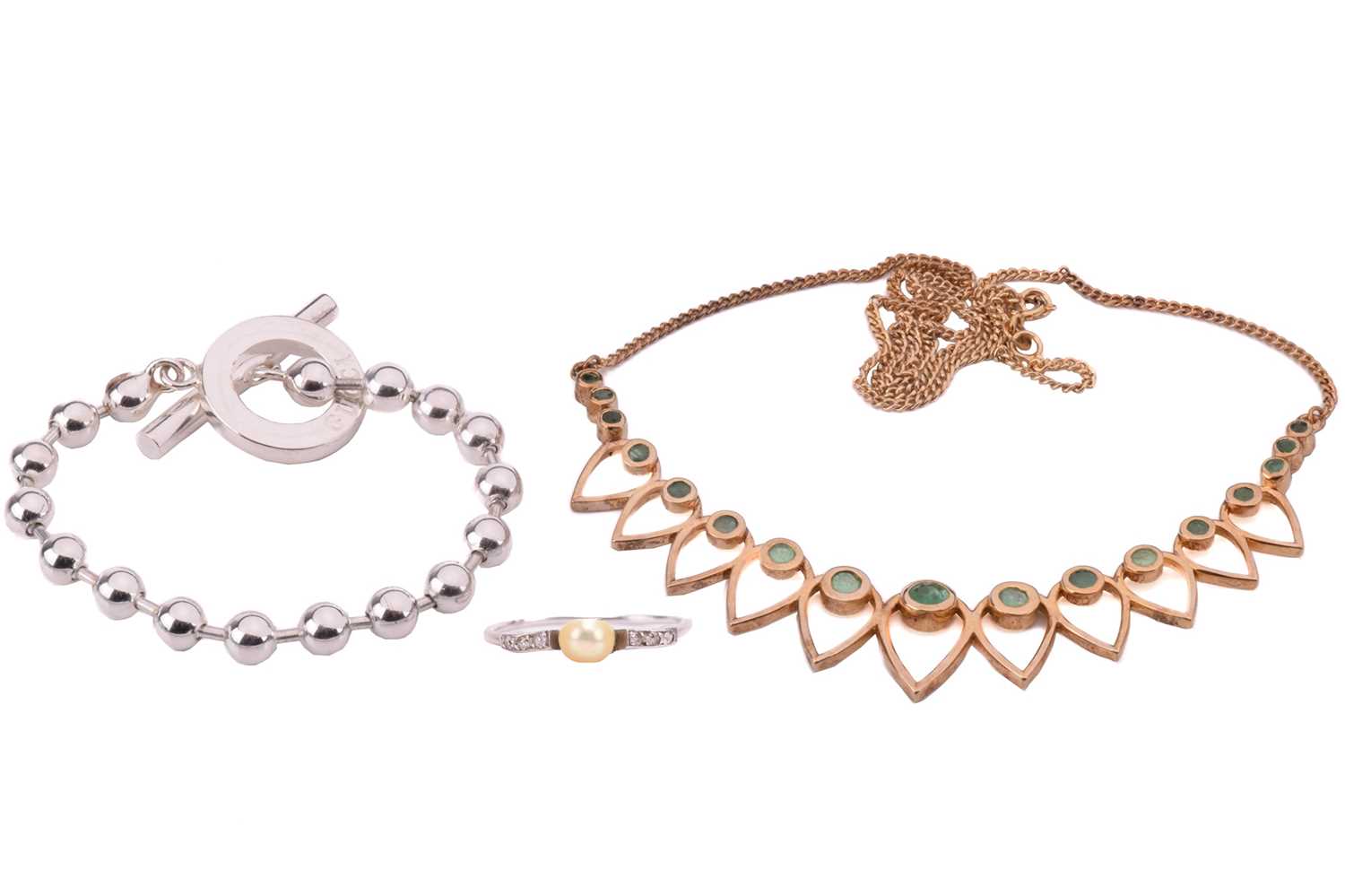 Lot 143 - Gucci. A Boule chain bracelet with a T bar...
