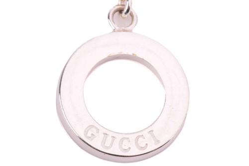 Lot 143 - Gucci. A Boule chain bracelet with a T bar...