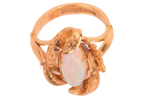 Lot 27 - An opal ring, set with white opal in a foliate...