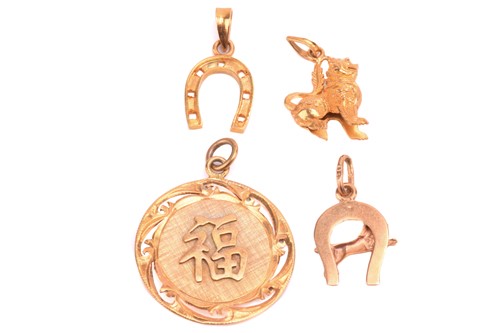 Lot 17 - A Chinese pendant with a symbol for prosperity,...