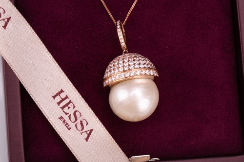 Lot 322 - A "Mother of Pearl" necklace by Hessa Jewels...