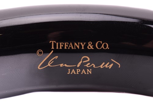 Lot 298 - Tiffany & Co. - two lacquer bangles and a pair...