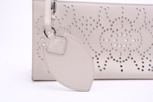 Lot 5 - Alaïa - two clutch bags in polished calfskin...