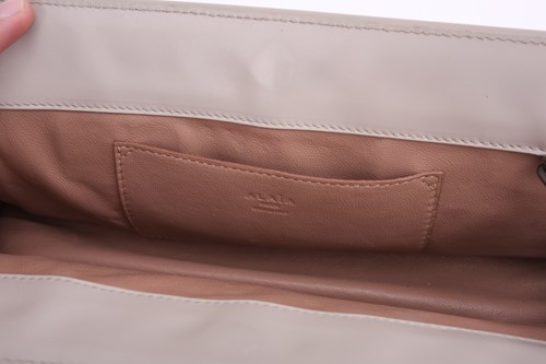 Lot 5 - Alaïa - two clutch bags in polished calfskin...