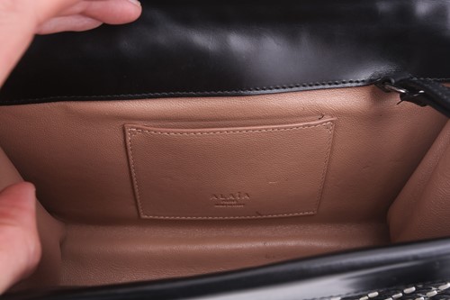 Lot 5 - Alaïa - two clutch bags in polished calfskin...