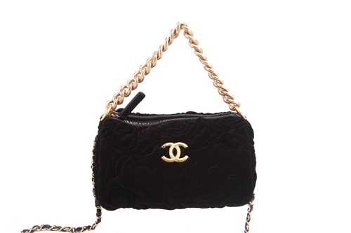 Sold at Auction: Chanel - a small bowling bag in black velour