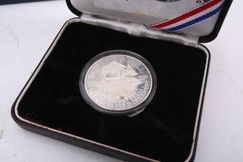 Lot 371 - Famous, silver, four coin collection,...