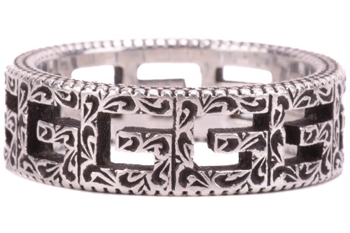Lot 36 - Gucci - a silver ring in 'Square G' cut-out...