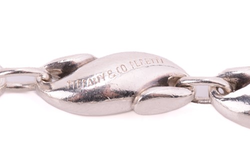 Lot 14 - Tiffany & Co. - a seahorse link bracelet by...