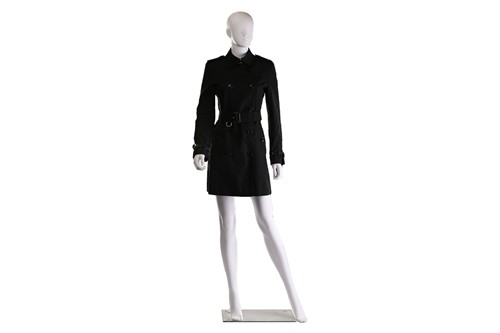 Lot 105 - Burberry - a 'Kensington' trench coat in black,...