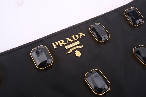 Lot 55 - Prada - a bejewelled 'Whips Pietre' clutch in...