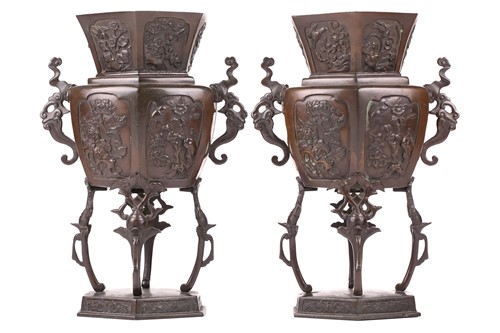 Lot 101 - A pair of Japanese patinated bronze Koro,...