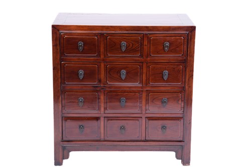 Lot 85 - A Chinese cherrywood twelve-drawer chest,...