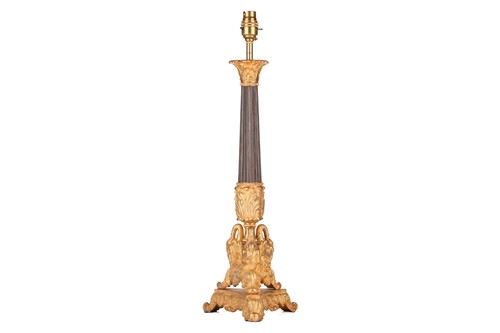 Lot 147 - A gilt and patinated metal table lamp, 20th...