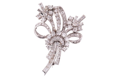 Lot 107 - A diamond floral spray brooch, set with round...