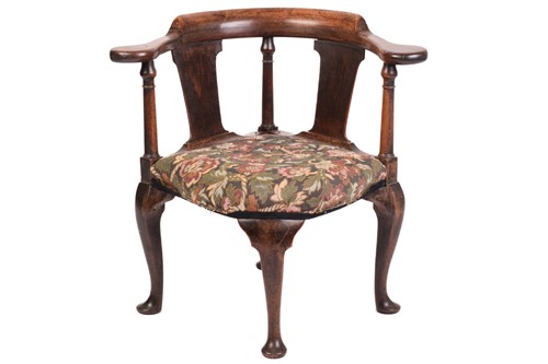 Lot 130 - A George II "Red Walnut" bow-backed corner...