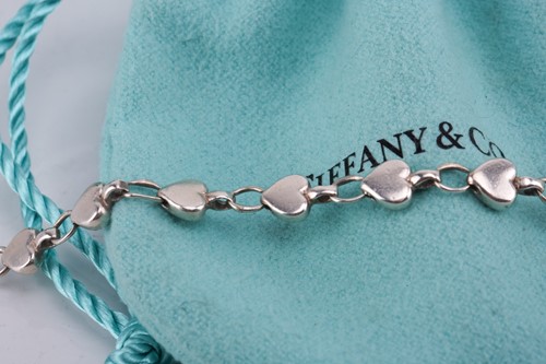 Lot 17 - Tiffany & Co. - a collection of heart-themed...