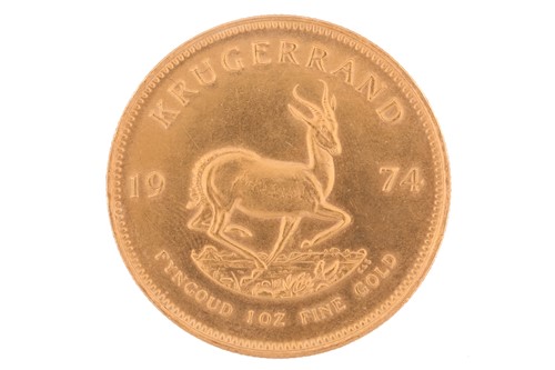 Lot 249 - A 1oz Krugerrand dated 1974, reverse Paul;...