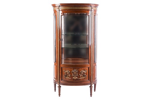 Lot 127 - A Louis XVI style rosewood bowfront vitrine,...