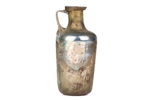 Lot 304 - A Roman glass oil ewer of slightly...