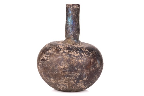 Lot 319 - A Roman bulbous glass vase, the rounded body...