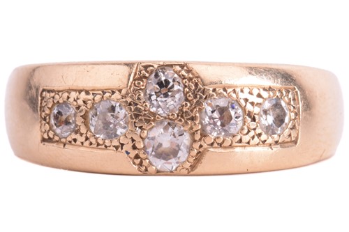 Lot 73 - A half-hoop ring set with six old-cut diamonds...