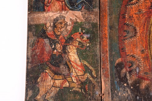 Lot 260 - A Greek Orthodox painted triptych icon, the...