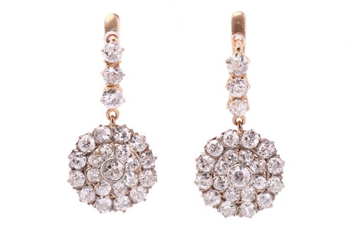 Lot 186 - A pair of diamond drop earrings, each set with...