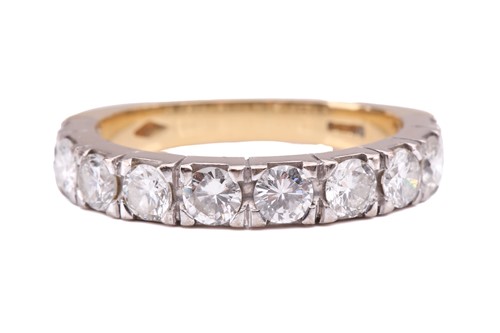 Lot 73 - A diamond half-eternity ring, set with a row...